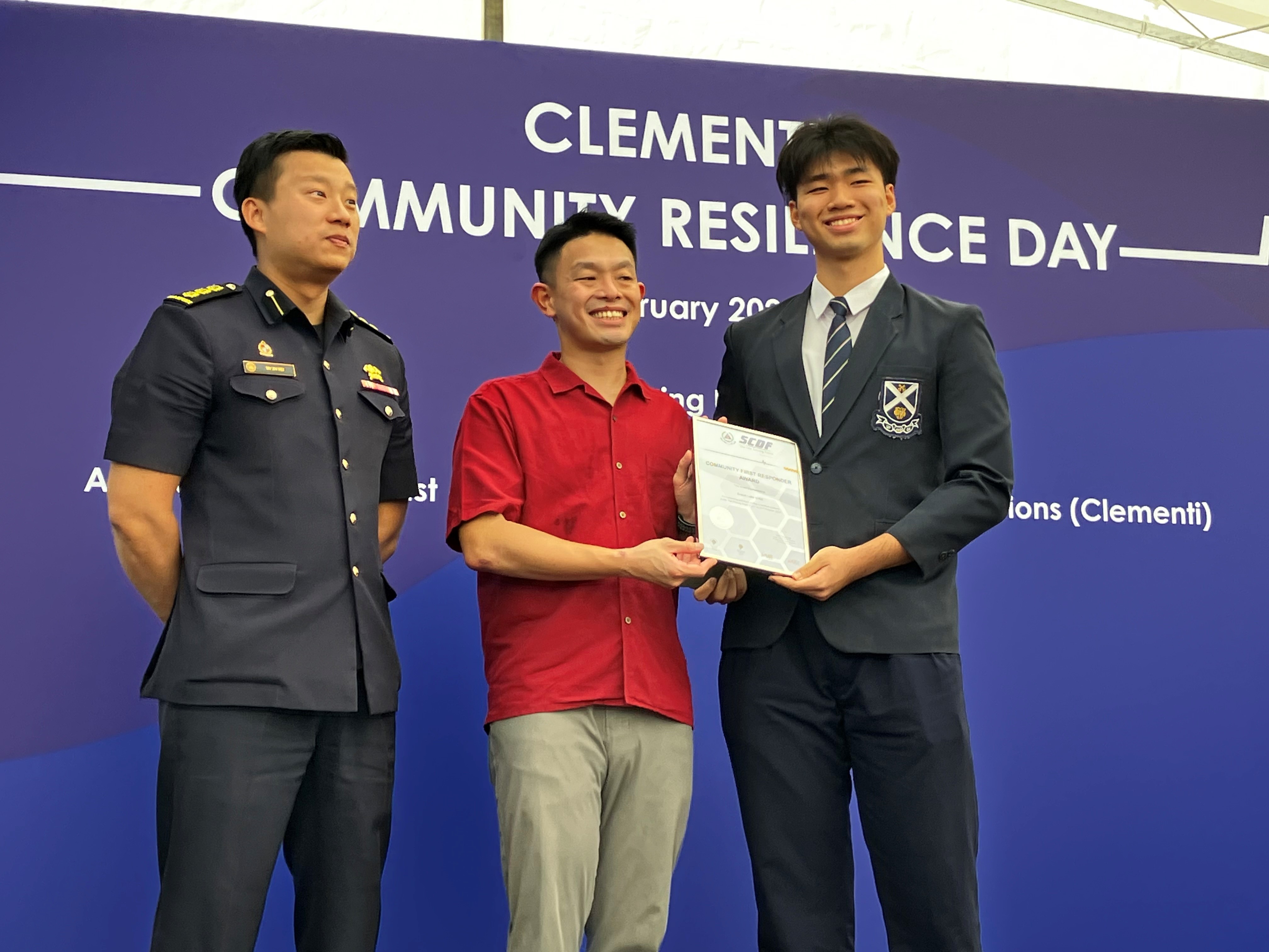 Enson receiving the award